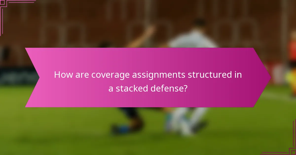 How are coverage assignments structured in a stacked defense?